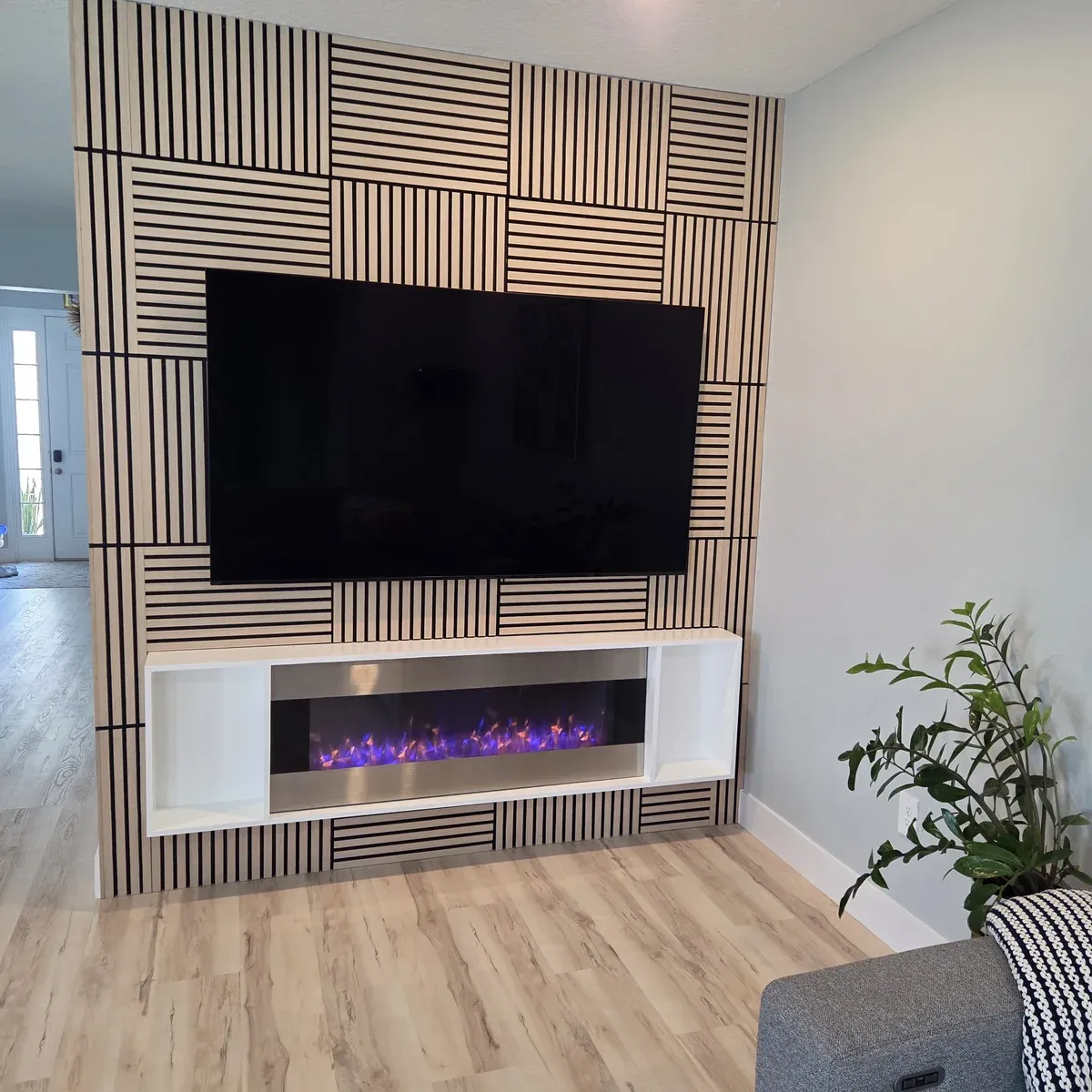 Custom wood slat accent wall TV feature