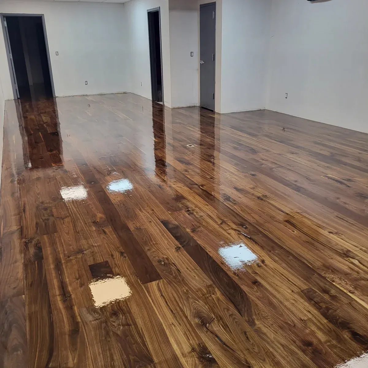Dark hardwood floor refinishing