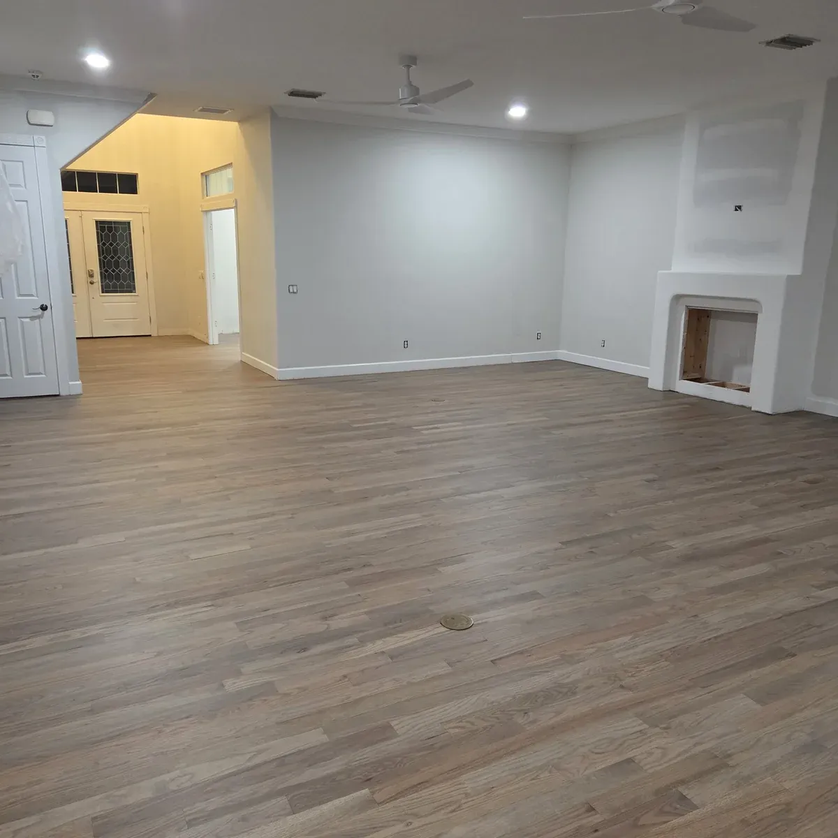 Light vinyl plank flooring in laundry room